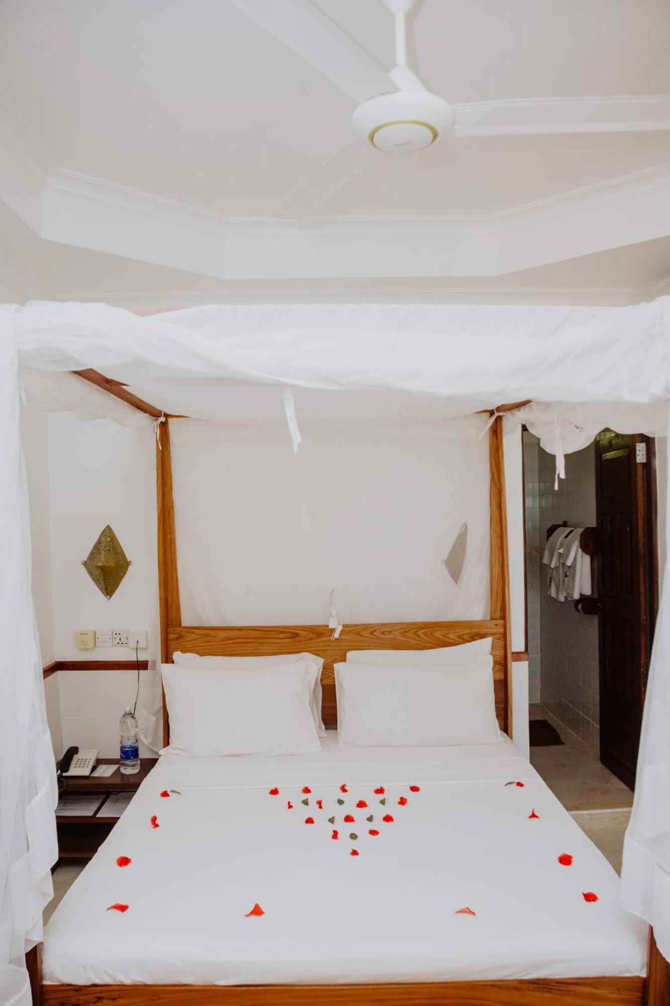 Mnarani Beach Cottages Нунгви Экстерьер фото